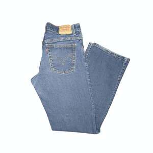 Vintage Levi’s 550 Relaxed Bootcut Jeans Size 10M Medium Wash Blue Denim Y2K VTG